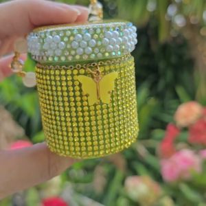 ยาดมสมุนไพรหงส์ไทย(สูตร2)เคสติดเพชรสีเหลือง ขอบมุก มีสายคล้องมือ