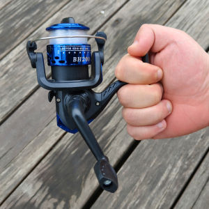 Spinning Fishing Reel สายพลาสติก 200 ตกปลา Reel 5.2: 1 พับได้เด็กเริ่มต้นล้อตกปลา