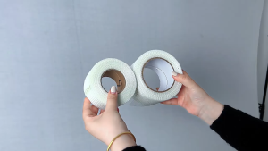 เทปกาวตาข่ายไฟเบอร์ (ยาว50เมตร) เทปกาวไฟเบอร์กลาส มีกาวในตัว ตาข่ายไฟเบอร์ ตาข่ายใยแก้ว ไฟเบอร์กลาสเทป ตาข่ายกันซึม ปิดรอยต่อ FIBERGLASS MESH