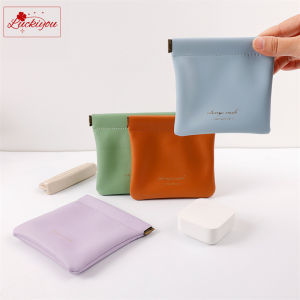 INS กระเป๋าเครื่องสําอางสีลูกกวาดขนาดเล็กแบบพกพาซองป้องกันกระเป๋าหูฟังเบ็ดเตล็ดลิปสติกหนัง PU กระเป๋าเก็บของ