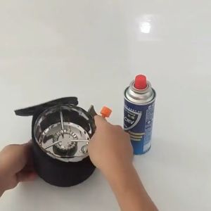 สินค้า เตาพกพาทรงกลีบบัวแบบมีสายถักต่อกระป๋องแก๊ส ทรงกลีบบัวกันลมได้ดี สำหรับแคมปิ้ง พร้อมกระเป๋าจัดเก็บ