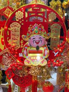 Thần tài lắc đầu treo trang trí tết hình tròn và hình thoi có đèn