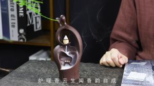 (รุ่นใหม่)พระพิฆเนศ ทรงเครื่องทอง ประทับดอกบัว ปางประทานพร พร้อมธูปหอมกำยาน เชิงกำยานควันน้ำตก แถมกำยาน20ดอก