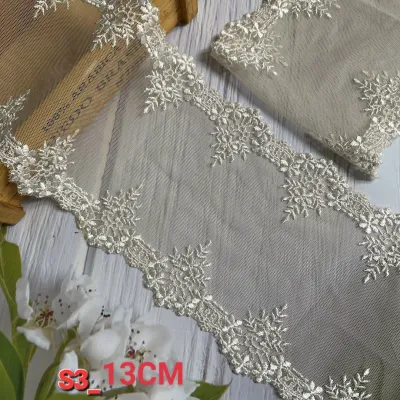 Ren lưới thêu chân 2 biên màu da bản rộng 9cm đến 18cm.