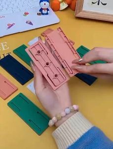 Removable Non-Marking Wall-Mounted Row Plug Holder & Fixed Socket Storage Rack