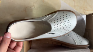 Fashionable and Breathable Womens Flat Mules Shoes Anti Slip and Hollow Out Design