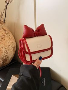 กระเป๋าสะพายข้างทรงสี่เหลี่ยมเล็กแบบสะพายข้างสำหรับผู้หญิง ปิดด้วยซิป ทรงสี่เหลี่ยมเล็ก ปิดด้วยรูปผีเสื้อ กระเป๋าสำหรับใส่ลิปสติกแบบลำลอง กระเป๋าสะพายข้างแบบมินิ กระเป๋าแฟชั่นสำหรับเด็กและเยาวชน