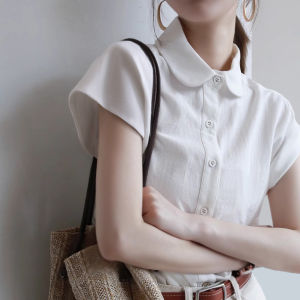 เสื้อเชิ้ตแขนกุดสไตล์ฝรั่งเศสสำหรับผู้หญิงในช่วงฤดูร้อนปี 2025 ทรงหลวม สีฟ้าหมอก คอกลม แขนกระดิ่ง เสื้อผ้าทำงานคอตตอน