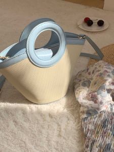 Scallop Bag 2024: A Must-Have Casual Shell Bag\\n\\n What is a Scallop Bag?\\n\\nScallop bags have been gaining popularity since their introduction in the fashion world. These bags are inspired by the beautiful shell of a scallop, a type of marine bivalve mollusk. Scallop bags are known for their unique design, versatility, and ability to match with various outfits.\\n\\n History & Evolution\\n\\nThe scallop bag trend began in the early 2000s, but it has gained significant traction in recent years, especially with the introduction of eco-friendly materials and sustainable production methods. As more people become conscious of their environmental impact, scallop bags have become a popular choice among fashion enthusiasts who want to make a positive impact on the planet.\\n\\n Key Features & Design Elements\\n\\nScallop bags are characterized by their distinct shell shape, which adds a touch of elegance and uniqueness to any outfit. They come in various sizes, colors, and materials, making them versatile enough to match with different styles and occasions. Some popular design elements include:\\n\\n- Shell-shaped silhouette\\n- Soft leather or eco-friendly fabric\\n- Durable hardware\\n- Adjustable straps\\n\\n How to Choose the Perfect Scallop Bag\\n\\nWhen selecting a scallop bag, it's essential to consider several factors to ensure that you find the perfect match for your style and needs.\\n\\n Material & Durability\\n\\nChoose a scallop bag made from high-quality materials like genuine leather or eco-friendly alternatives like recycled plastic or organic cotton. These materials not only look great but also provide durability and longevity.\\n\\n Size & Capacity\\n\\nConsider the size of the bag based on your daily needs. A small scallop bag may be suitable for a casual day out, while a larger one could be ideal for carrying essentials during a busy workday.\\n\\n Style & Matching Tips\\n\\nTo make the most of your scallop bag, choose a style that complements your personal taste and matches well with your wardrobe. For instance, a neutral-colored scallop bag can easily pair with various outfits, making it a versatile addition to any collection.\\n\\n Why Scallop Bags Are Trending in 2024\\n\\nScallop bags have become increasingly popular due to their unique design, adaptability, and eco-friendliness.\\n\\n Popularity Among Women\\n\\nWomen across all age groups have embraced the scallop bag trend, thanks to its ability to add a touch of elegance and uniqueness to any outfit. From casual weekend outings to formal events, scallop bags are a versatile accessory that can elevate any look.\\n\\n Versatility & Adaptability\\n\\nThe scallop bag's adjustable strap allows for both shoulder and crossbody wear, making it easy to transition from one occasion to another. Whether you're running errands or attending a formal event, a scallop bag can keep up with your lifestyle.\\n\\n Sustainable & Eco-Friendly Options\\n\\nWith growing concerns about environmental impact, scallop bags made from eco-friendly materials have become increasingly popular. These bags not only look great but also contribute to a greener planet.\\n\\n How to Style Your Scallop Bag\\n\\nTo make the most of your scallop bag, consider these styling tips for different occasions.\\n\\n Casual Outfits\\n\\nPair your scallop bag with casual outfits like jeans, t-shirts, or dresses for a relaxed yet stylish look. A neutral-colored scallop bag can easily match with various casual outfits.\\n\\n Formal Events\\n\\nFor formal events, choose a scallop bag that complements your outfit's color and style. A metallic or jewel-toned scallop bag can add a touch of elegance to your formal look.\\n\\n Everyday Carry Essentials\\n\\nMake sure your scallop bag has enough capacity to carry your everyday essentials like a phone, wallet, and keys. A small to medium-sized scallop bag with multiple compartments can keep your belongings organized and easily accessible.\\n\\nIn conclusion, scallop bags are a must-have accessory for any fashion enthusiast. With their unique design, versatility, and eco-friendliness, they offer a perfect blend of style and functionality. So why not try one out and see how it elevates your wardrobe?\"