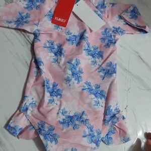 Đồ bơi bé gái liền thân [XẢ KHO] Bikini đi tắm biển trẻ em 1 mảnh Yuke màu hồng hoa lá xanh (12-35kg)