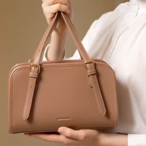 OOKAS brown leather handbag with adjustable straps and silver buckles