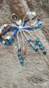 Nơ pha lê handmade – charm treo túi / móc khóa pha lê phản sáng