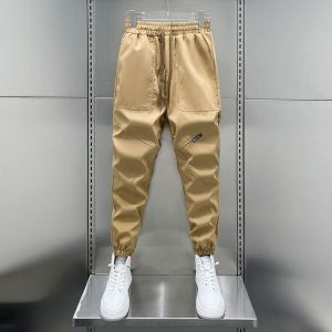 Quần Dài Nam Cạp Chun Mùa Xuân Thu Mới Thời Trang Chống Gió Chống Thấm Nước Quần Dài Thường Ngày Rộng Rãi Thoải Mái