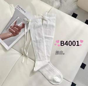 Sweet Korean design womens calf socks matched with ballet style skirts and bow pile socks 甜美韩系设计感女小腿袜子百搭配芭蕾风裙子蝴蝶结堆堆袜