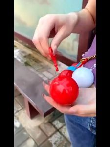 Raincoat Gantung Desain Bola: Jas Hujan Gantung Portable