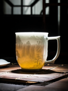 JINGDEZHEN | Jingdezhen Celadon Carved Porcelain Tea Cup