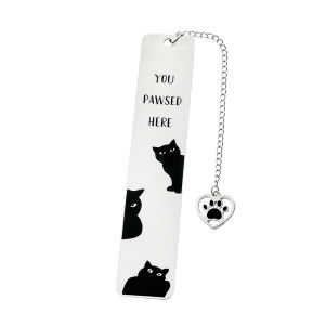 A theme bookmark with paw charm - "You Pawsed Here" quote and cute cat design suitable for cat enthusiasts book lovers.