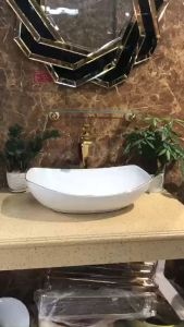 CHẬU RỬA MẶT LAVABO THUYỀN VÀ VÒI ĐỒNG TAY LÁ MẠ VÀNG