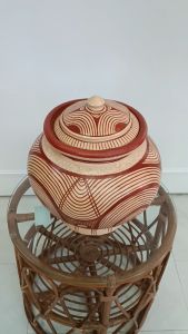 โถมีฝาบ้านเชียงโถดินเขียนลายมีฝาหนึ่งในลายที่ขุดค้นพบบนภาชนะจริง