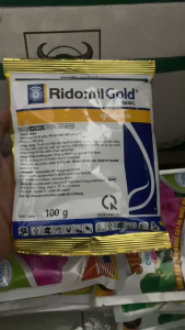 Thuốc trừ bệnh RIDOMIL GOLD 68WG - Gói 100gr - Đặc trị nấm (như Phytophthora) gây thối rễ xì mủ và sương mai trên nhiều loại cây trồng.