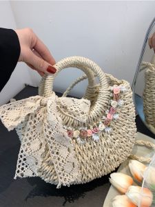 กระเป๋าถือใบหญ้าสไตล์ฝรั่งเศส ฤดูร้อนปี 2025 กระเป๋าสะพายข้างใบหญ้าใหม่ กระเป๋าถือชายหาด ผ้าไนลอนสีพื้น กระเป๋าถือแบบแขวนไหล่สำหรับผู้หญิง