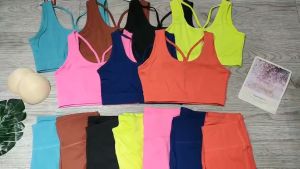 Bộ đồ tập gym yoga aerobic thể thao nữ bao gồm áo bra phối lưới kèm mút và quần dài lưng cao chất liệu thun poly BINSPORTS BD233