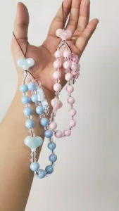 Elegant Beaded Phone Charm Lanyard - Fashionable Mobile Accessory in Pink/Blue Heart Design