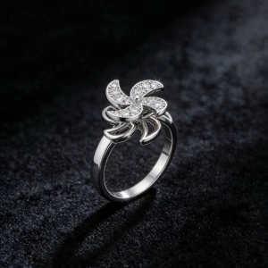 Versatile elegant and simple this ring features a rotating windmill design