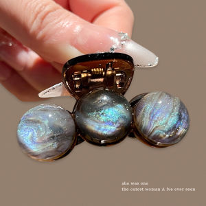 NING ZHOU | Elegant Small Hair Claw for Thin Hair with Blending Planets Design