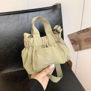 กระเป๋าสะพายไหล่ผ้าใบขนาดเล็กสำหรับผู้หญิง ฤดูใบไม้ร่วง/ฤดูหนาว ดีไซน์ใหม่ 2025 กระเป๋าถือแบบสะพายข้างแบบลำลอง