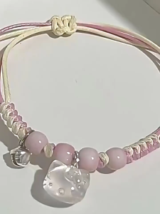 SEA JJT สินค้าใหม่สร้อยข้อมือถักลายการ์ตูน Hello Kitty สำหรับผู้หญิงสายคล้องมือถักด้วยมือสีชมพูสไตล์สาวหวานระดับไฮเอนด์