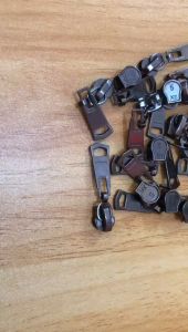 Kepala Resleting Coil No.5 Ngunci & Isi 100 Pcs