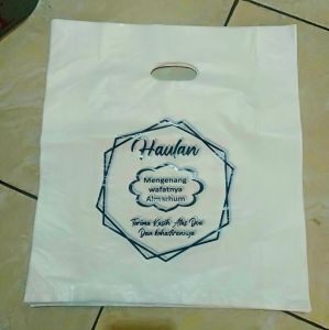 kantong plastik haulan mengenang wafatnya almarhum ukuran 30x40 isi 50lbr/pack
