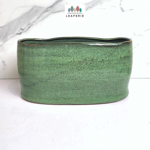 The Leaferie Donne long shallow plant pots. flowerpot . flowerpots . flower pot . planter . planters . Ceramic . Plants