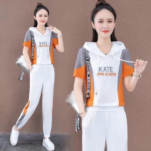 ชุดกีฬาลำลองสำหรับผู้หญิง ฤดูร้อนปี 2025 แฟชั่นกระชับสัดส่วน เอวสูง แขนสั้น หลวมๆ ไซส์ใหญ่ ชุดสองชิ้น แขนสั้น ทรงหลวม