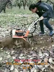 Máy xới đất lên luống vun cỏ ngô cầm tay