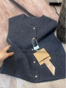 Spring Autumn 2025 Short Sleeveless Knitted Vest Soft round Neck Commute Style Korean Simple Design Golden Buckle Versatile Top