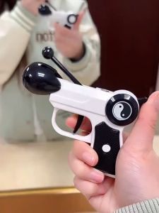 Bật lửa hột quẹt mô hình súng gõ mõ tịnh tâm độc lạ