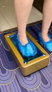 Máy bọc giày dép trong nhà tặng kèm túi bọc 100 chiếc