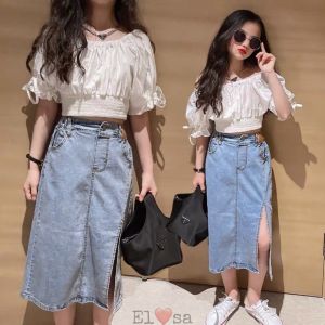 Váy bé gái kèm túi xách dạ kẻ