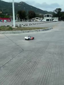 FMS | Meijiaxin 14211 short card 1/14 four-wheel drive off-road drift flat running electric remote control car brushless gyro RC car