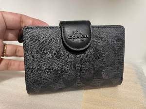 Like new authentic preloved coated canvas corner zip medium bifold wallet
