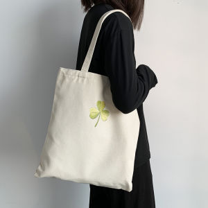 กระเป๋าผ้าแคนวาสความจุขนาดใหญ่ 2024 Lucky Grass การ์ตูน ศิลปะ สไตล์สด Academy กระเป๋าถือเดินทางกระเป๋าสะพายไหล่สําหรับทํางานพักผ่อน