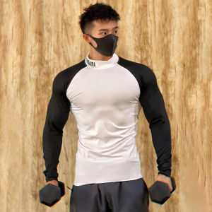 เสื้อยืดคอตั้งแขนยาวแห้งเร็วสำหรับออกกำลังกายในช่วงฤดูใบไม้ร่วงและฤดูหนาว ผ้าโพลีเอสเตอร์ ระบายอากาศได้ดี เสื้อออกกำลังกายสำหรับผู้ชาย