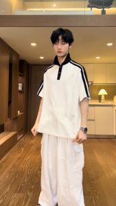 CLIFF เสื้อโปโลสีเย็บปะติดปะต่อกันใหม่แขนสั้นในฤดูร้อน เสื้อเชิ้ตคอม้วนลําลองหลวม ๆ