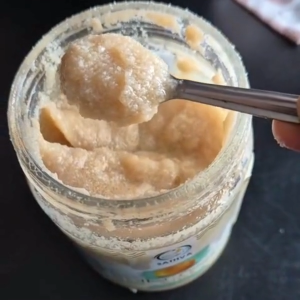 Sathva Hand Churned Cows milk Ghee 500ml. Light brown shade aromatic and grainy texture