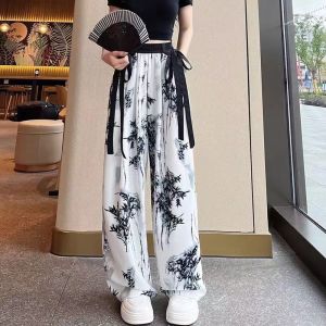 กางเกงขายาวทรงหลวมผ้าชีฟองไหมน้ำแข็งสำหรับผู้หญิงในฤดูใบไม้ร่วง กางเกงขายาวทรงตรงเอวสูง ทรงลำลอง ลายดอกไม้ ชุดทำงาน