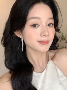 Elegant Long Pearl Tassel Earrings: Stylish Jewelry for Women with Large Round Faces