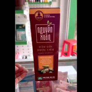 Dầu gội dược liệu Nguyên Xuân hương dược liệu màu nâu đỏ OK359 dành cho tóc thường 250ml