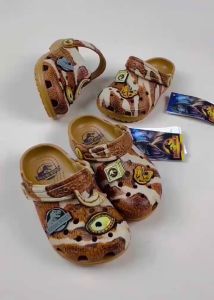 Dép Cross Khủng Long Nâu Jurassic World cho bé trai trẻ em Sục Cros HannaKids giày xục Cros Classic Clog Kid Xăng đan